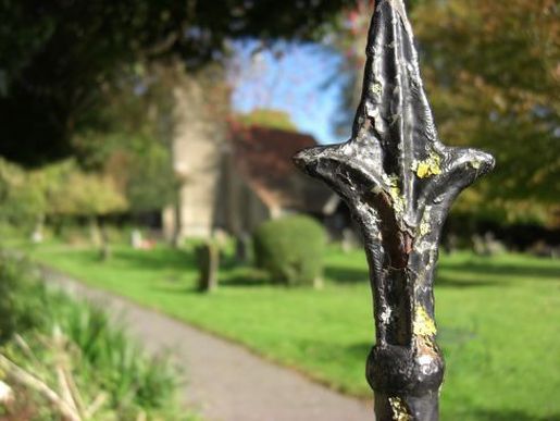 Coking Church - weathered railings in front of the Saxon Church