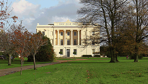View of the grand white facade of Burton Park Picture of Burton Park at Duncton, near Petworth in Sussex