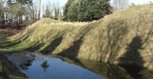 picture of the earthwork remains of the former Norman Castle at Church Norton, near Pagham Harbour in West Sussex.