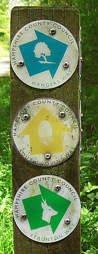 Queen Elizabeth Country Park near Waterlooville. Part of our guide to the South Downs Way Picture of Stuanton Way, Hangers Way and South Downs Way marker posts
